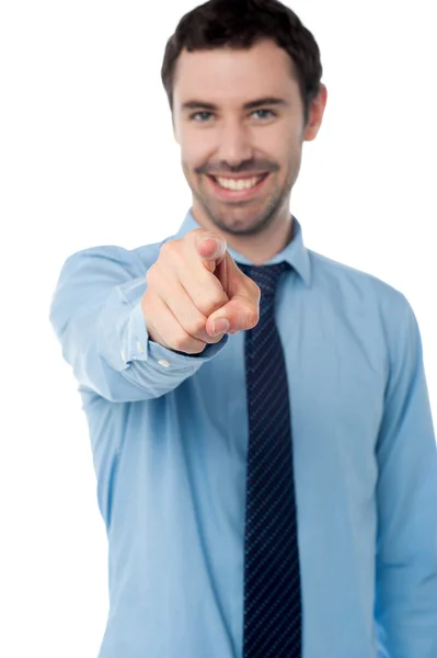 Businessman pointing towards camera — Stock Photo, Image