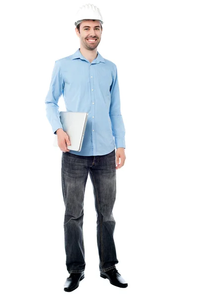 Construction engineer posing with laptop — Stock Photo, Image