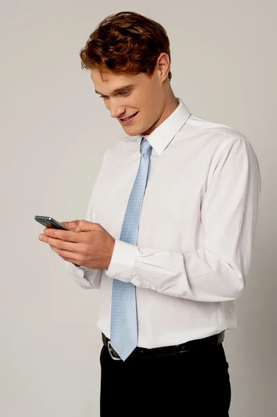 Businessman reading a text message — Stock Photo, Image