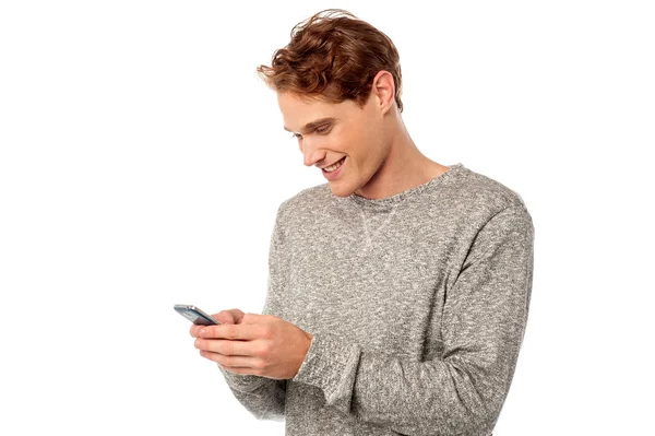 Stylish guy using mobile phone — Stock Photo, Image