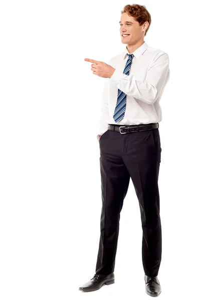 Businessman pointing away — Stock Photo, Image