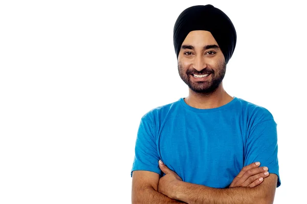 Handsome young smiling guy, arms crossed — Stock Photo, Image