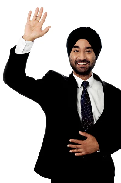 Businessman waving hi to his colleague — Stock Photo, Image