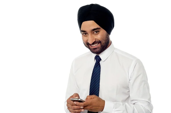 Young businessman using mobile phone — Stock Photo, Image