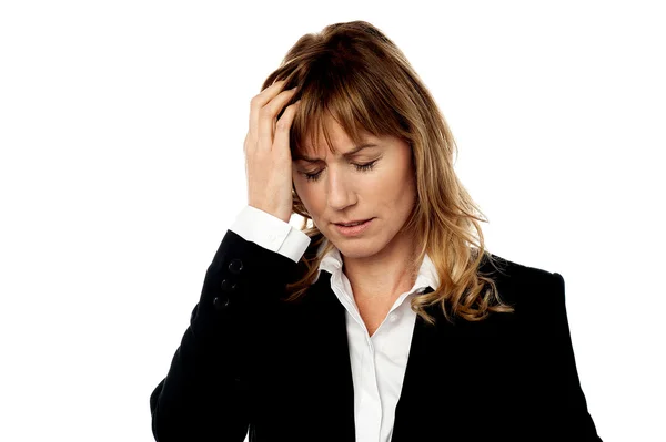 Corporate woman having headache — Stock Photo, Image