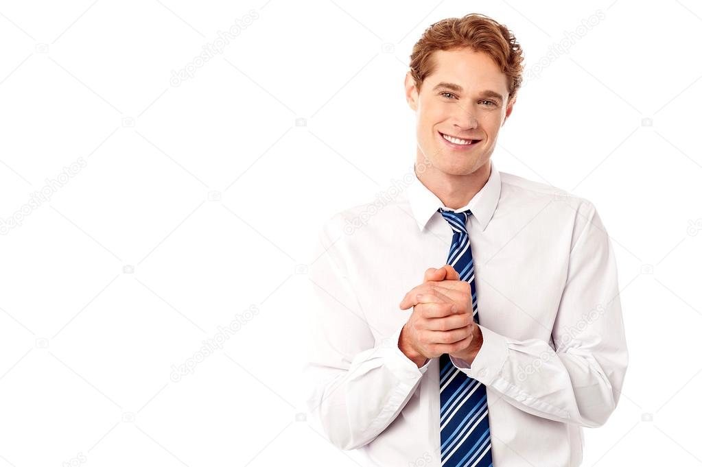Corporate guy posing with clasped hands