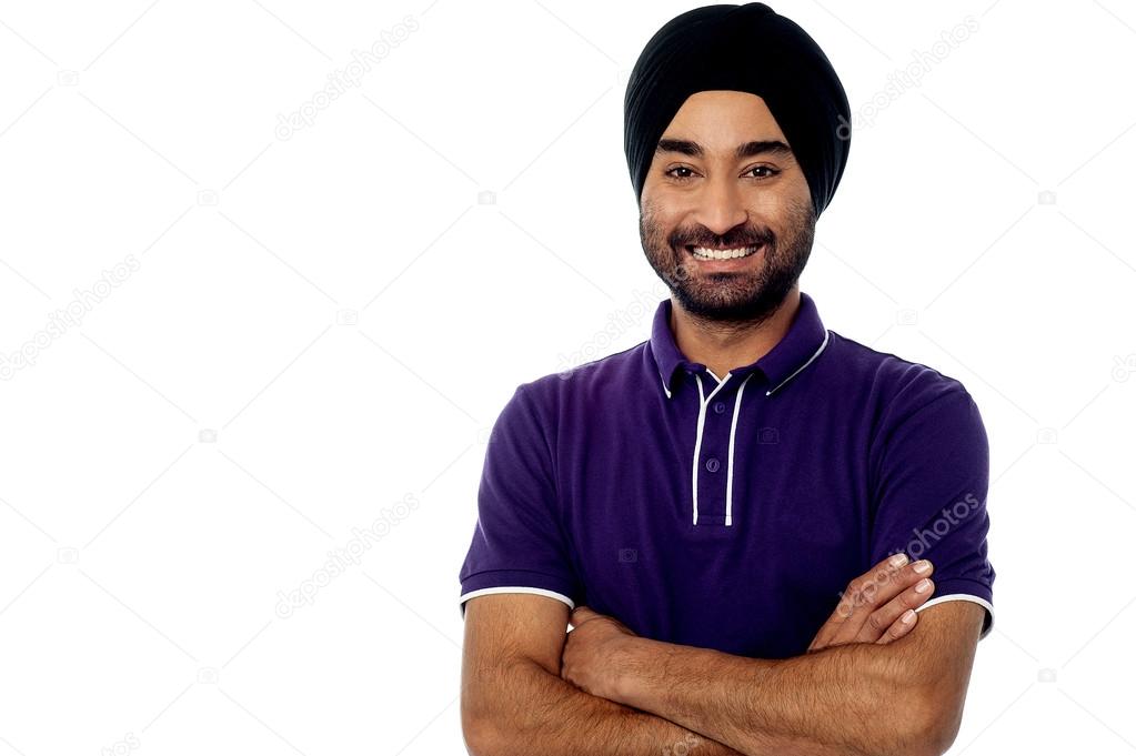 Young man posing casually over white