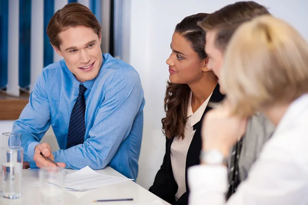 Partners at workplace discussing an idea — Stock Photo, Image