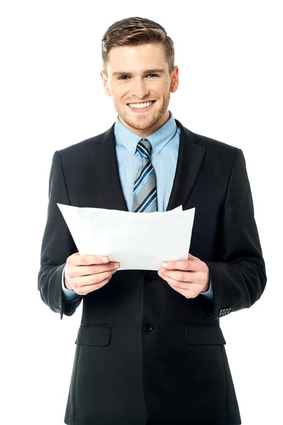 Businessman holding important deal documents — Stock Photo, Image