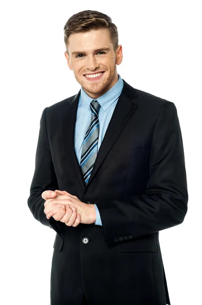 Corporate guy posing with clasped hands — Stock Photo, Image