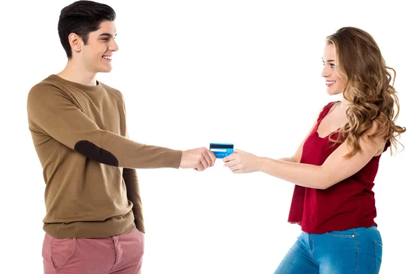 Girlfriend sweetly snatching credit card — Stock Photo, Image