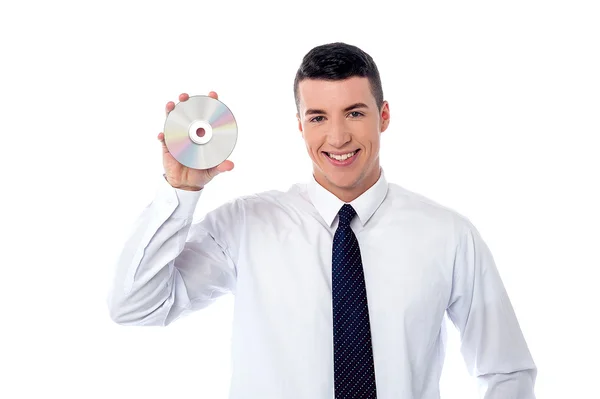 Manager showing compact disc — Stock Photo, Image