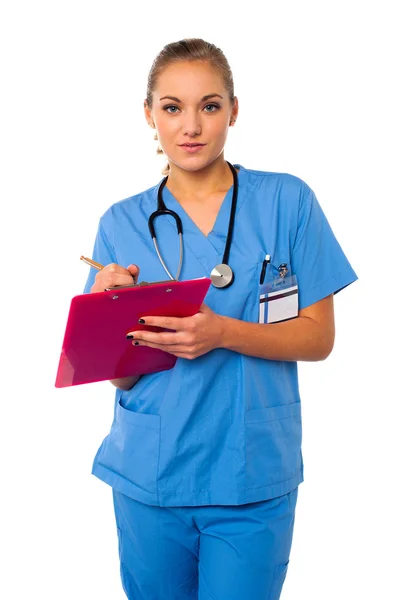 Medical professional writing case history Stock Photo