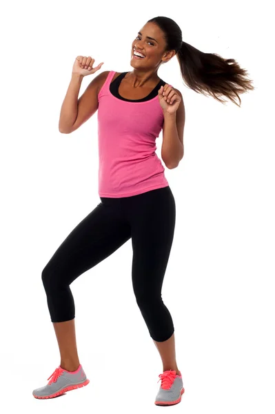 Excited young female fitness trainer Stock Image