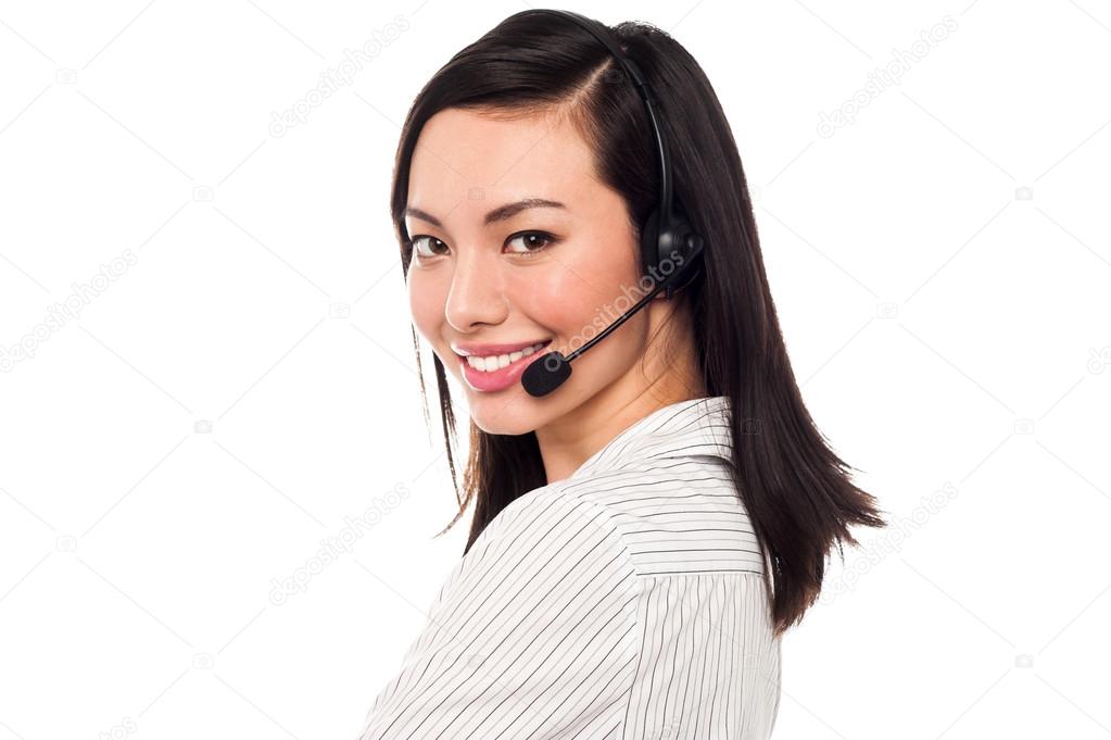 Smiling attractive call center executive
