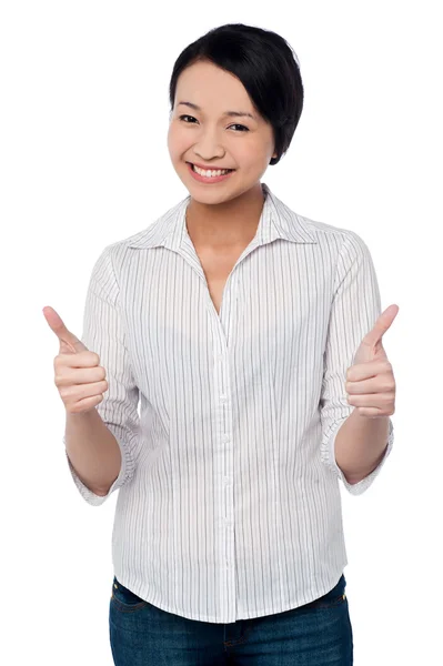 Happy beautiful girl giving two thumbs up — Stock Photo, Image