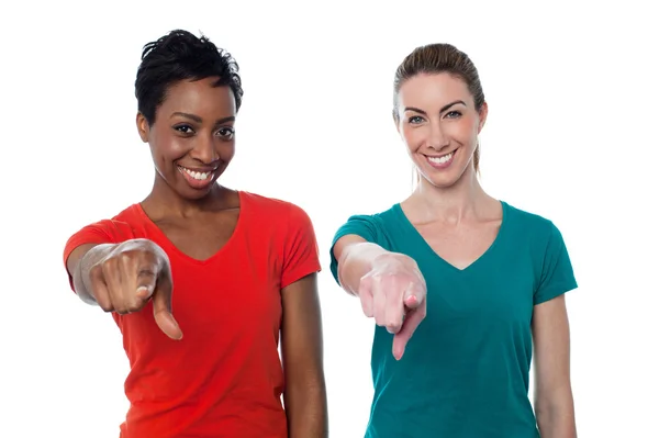 Smiling friends pointing to you — Stock Photo, Image