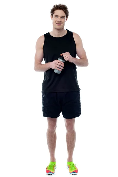 Man holding bottle of water — Stock Photo, Image