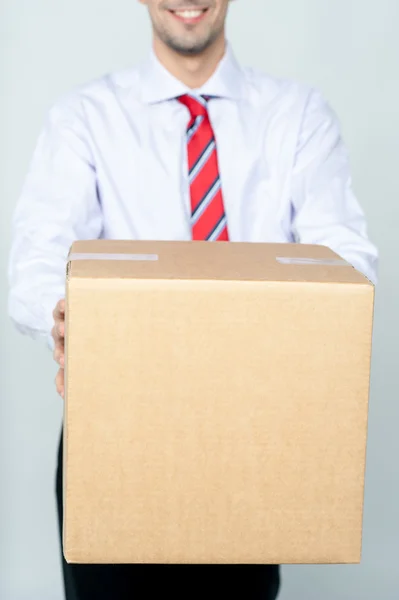 Delivery man with box — Stock Photo, Image