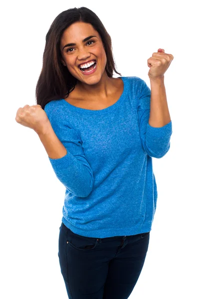 Excited pretty girl with clenched fists — Stock Photo, Image