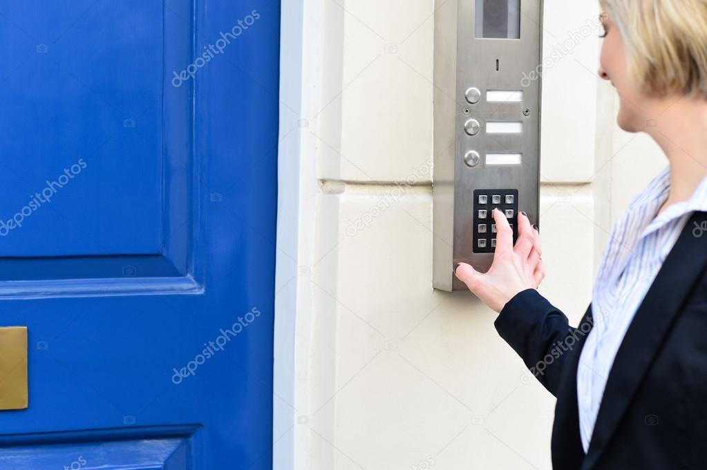 Woman using security system