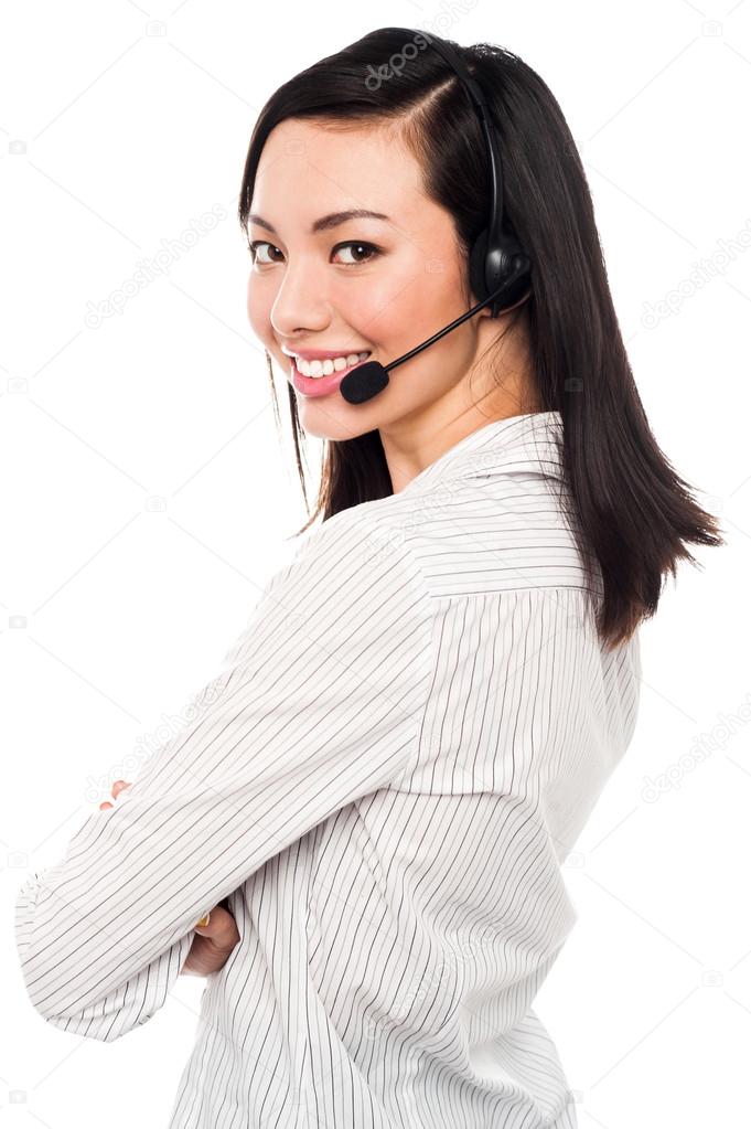 Smiling young call center executive