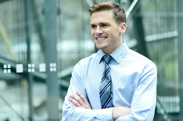 Smiling young business executive — Stock Photo, Image