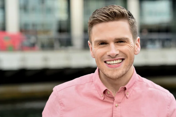 Handsome young man posing casually — Stock Photo, Image