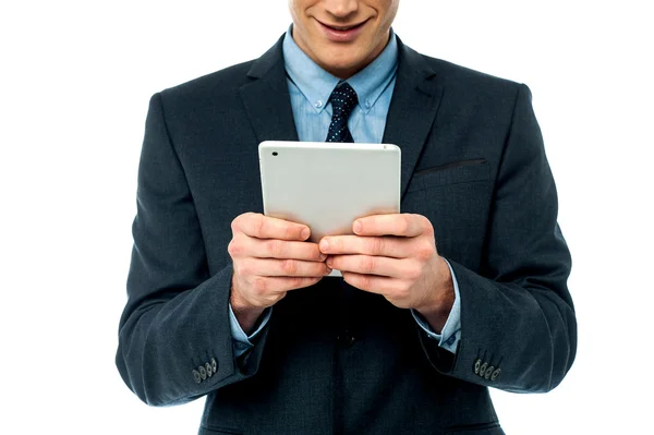 Businessman browsing on tablet pc — Stock Photo, Image