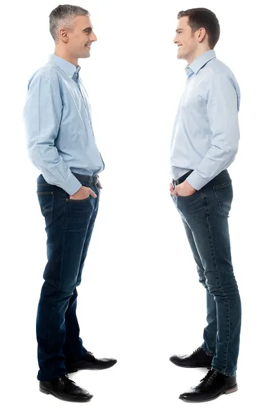 Happy young men standing together — Stock Photo, Image