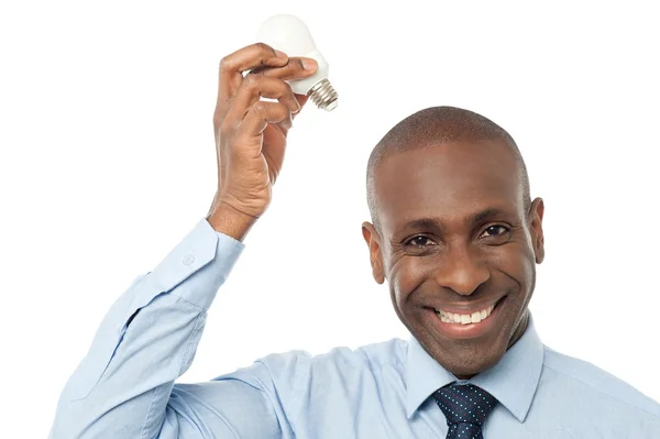 Businessman thinking with a light bulb — Stock Photo, Image