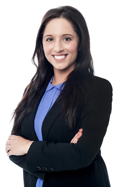Businesswoman posing with folded arms — Stock Photo, Image