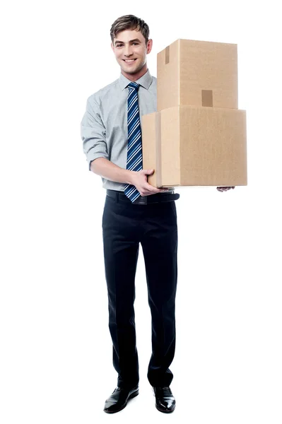 Homme avec une pile de boîtes — Photo