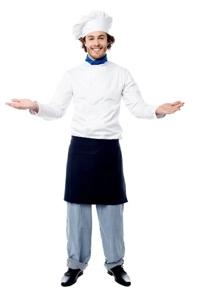 Chef-kok in uniform verwelkomen gasten — Stockfoto