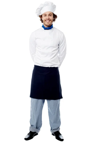 Young chef with hands behind — Stock Photo, Image