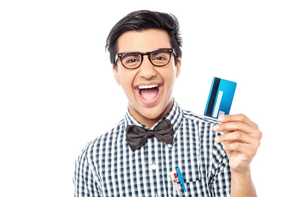Laughing guy holding credit card — Stock Photo, Image