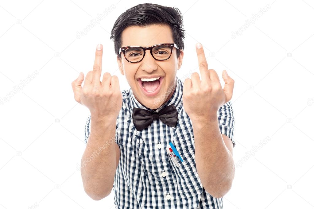 Cheerful man giving the middle finger