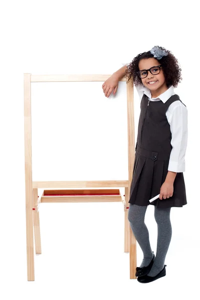 School kid with hand on whiteboard — Stock Photo, Image