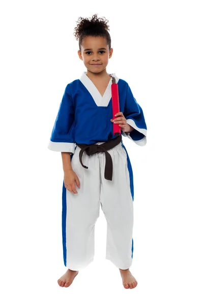 Karate girl with nunchaku — Stock Photo, Image