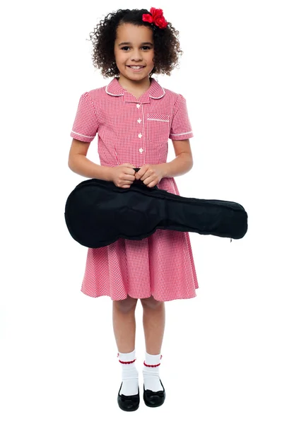 Girl heading for the music class — Stock Photo, Image