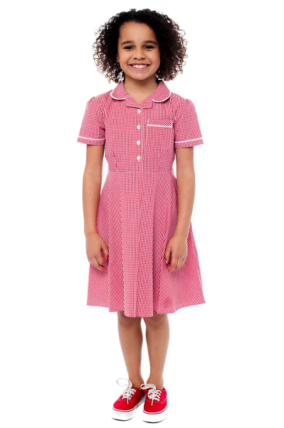 School meisje in roze uniform — Stockfoto