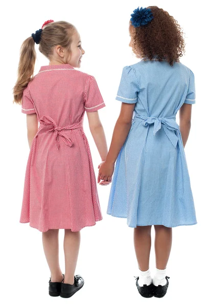 School girls holding hands Stock Picture