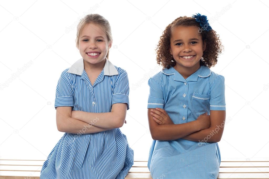 School girls sitting in bench