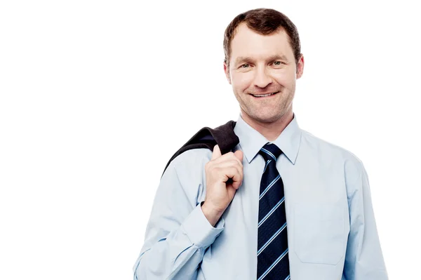 Businessman with his jacket over his shoulder — Stock Photo, Image