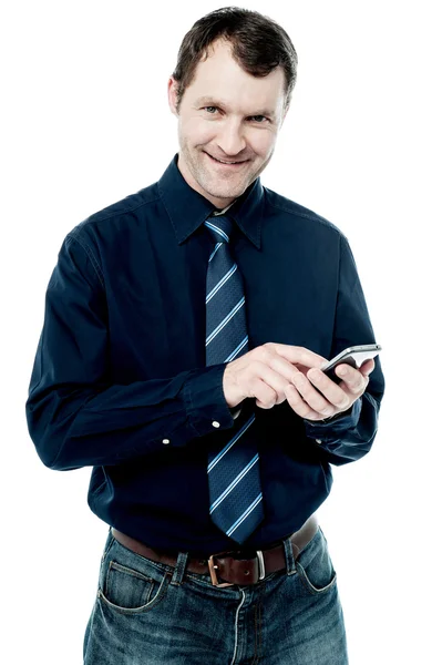 Business executive using his cell phone — Stock Photo, Image