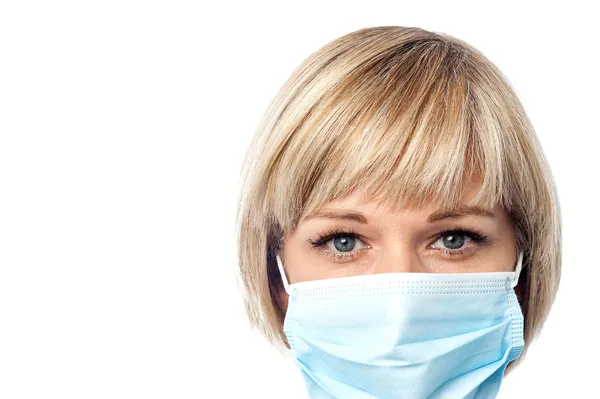 Female physician wearing medical mask — Stock Photo, Image