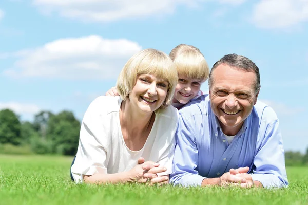 Parents having fun with daughter — Stock Photo, Image