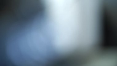 Light blue image with light motion. Blurred background image.