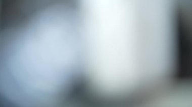 Light blue image with light motion. Blurred background image.