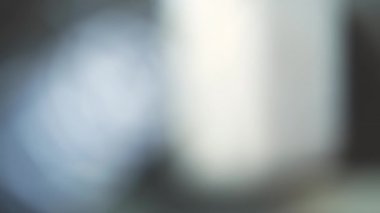 Light blue image with light motion. Blurred background image.